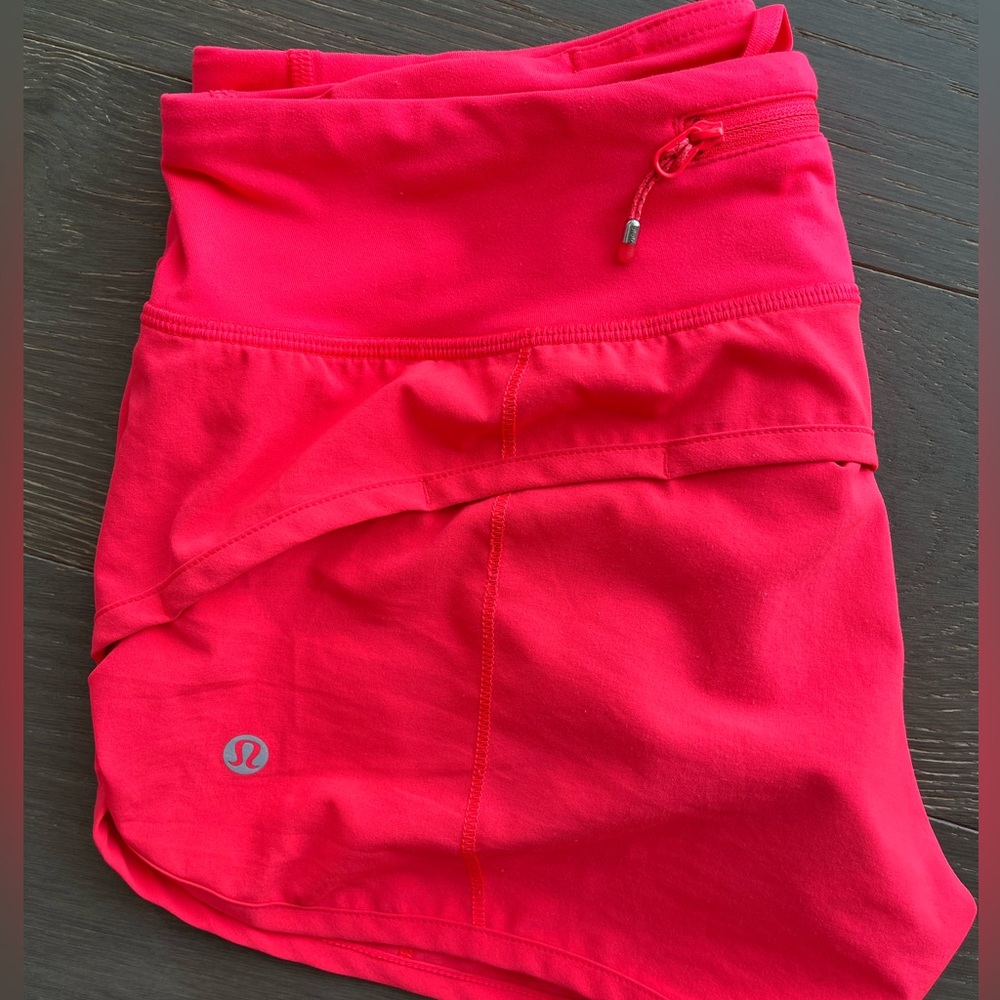 Lululemon Women's Speed Up Low Rise Shorts
Size 4 Bright Coral Color